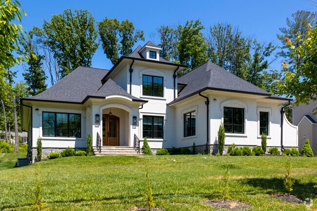 Majestic homes sitting on lush green lawns can be found throughout Tysons Corner.