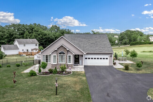 In Park Crest, you can find a newer style ranch home with a large lawn.