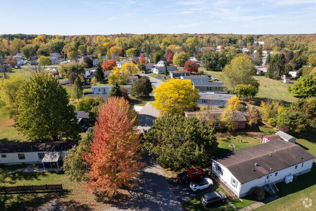 Tree-lined streets and colorful fall foliage highlight Clarendon’s peaceful neighborhoods and open landscape.