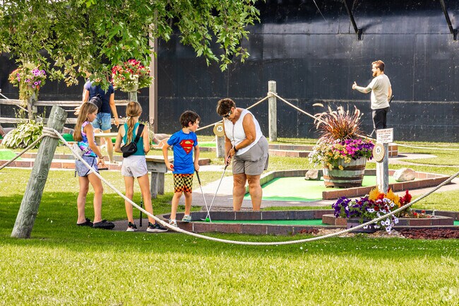 Play a game of mini golf at Capt'n J's Miniature Golf on Barker's Island.