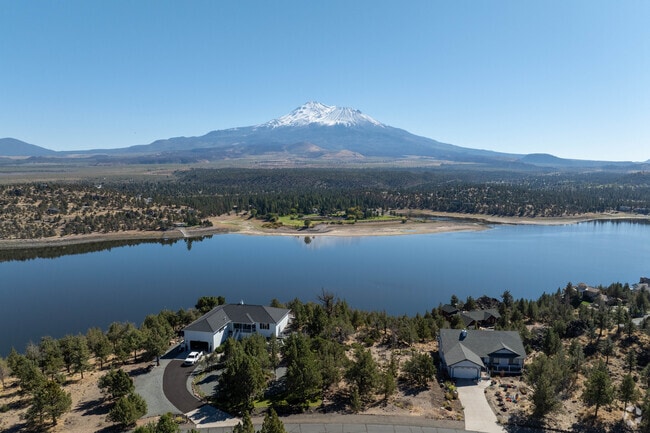 Mount Shasta rises 30 miles south of Lake Shastina, offering hiking and ski trails year-round.