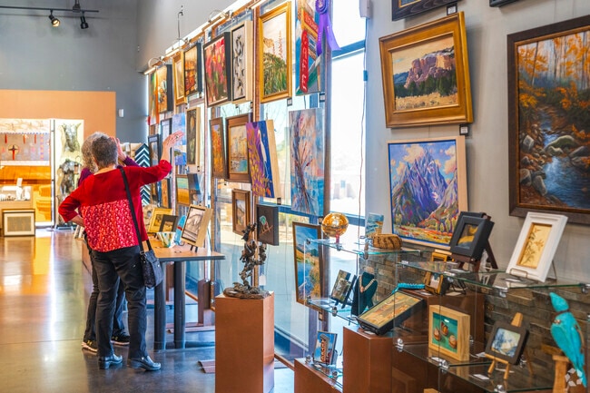 Locals enjoy the beautiful artwork at the Mixed Media Art Show at Weems Gallery only a mile away from Peppertree.