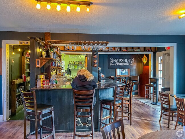 Grab a drink at the Snapshot Lounge in Granville.