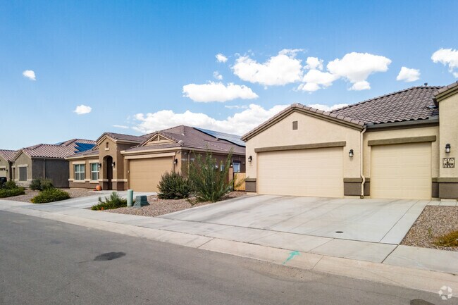 Three-car garages are a common sight in Saguaro Bloom.