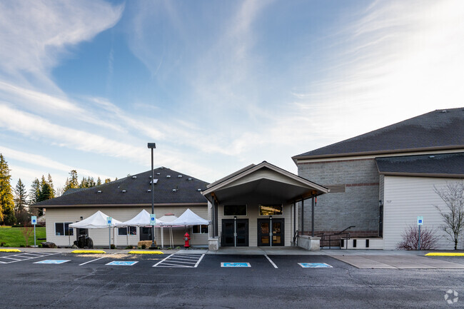 The back entrance and play structure for smaller children.