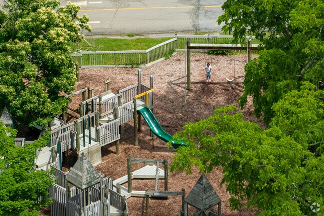 Students come to Newfield Elementary even in the summer to swing on the swingset.