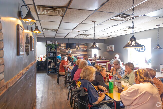Diners gather in a lively Weston restaurant.