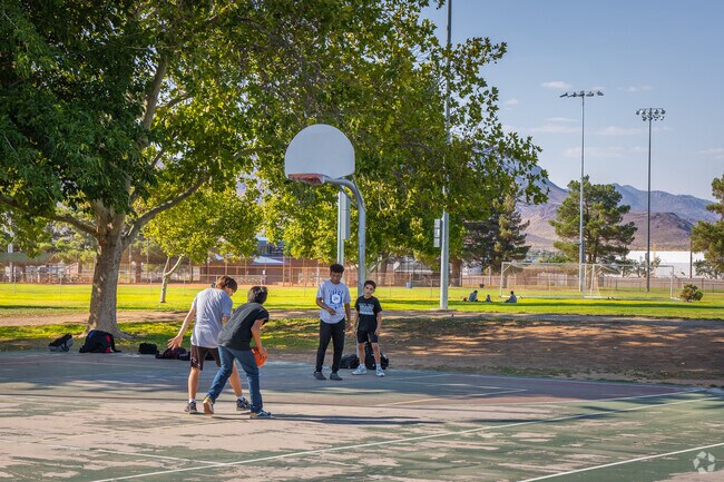 New Kingman-Butler locals can be seen playing basketball at Centennial Park.