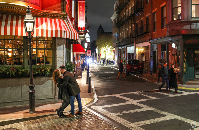 The lantern lit cobblestone streets cast a romantic glow on the North End.