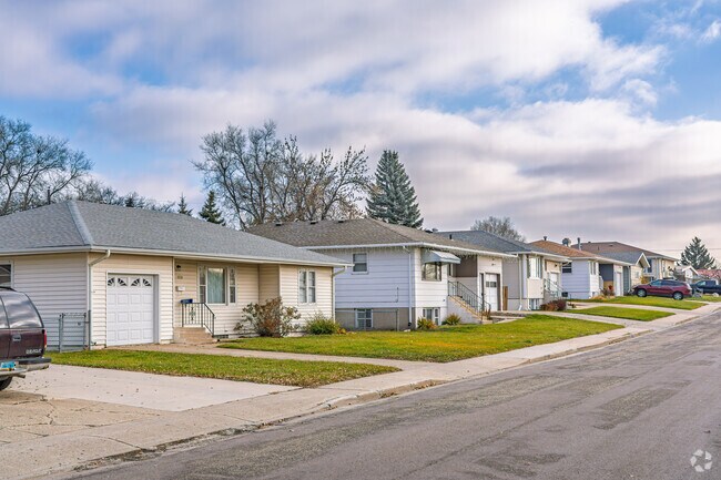 Park Hill has a mixed bag of homes, wide roads, and a friendly vibe, perfect for first-time buyers.