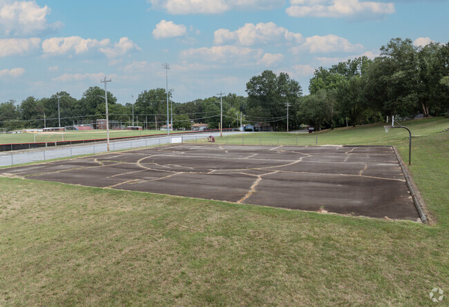 An old basketball court on the campus of Discovery High School.