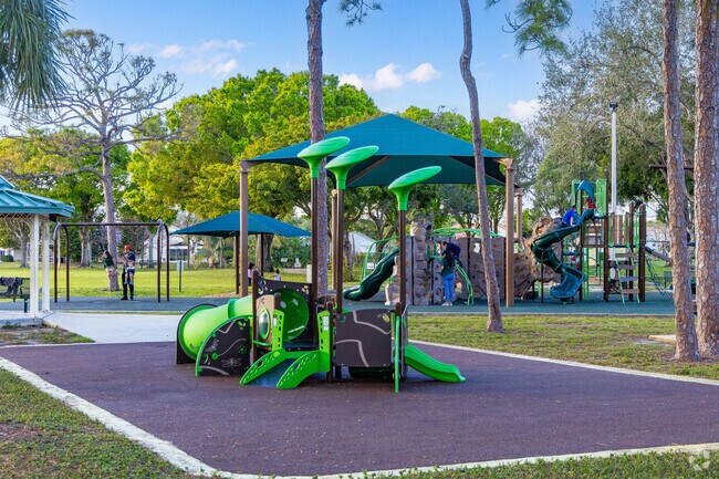Greenacres residents enjoying the playground at Samuel J. Ferreri Community park.
