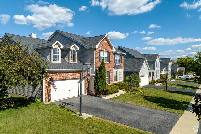 At Rainbow Hills, mid-sized homes have brick and stone details and sit on single lots.