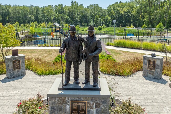 West Nyack Green and Firefighter Memorial Park features walking paths and a playground.