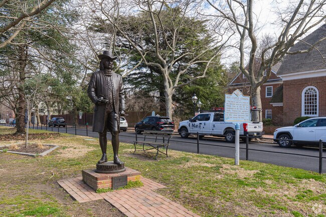This statue in New Castle honors William Penn, a prominent historical figure of New England.