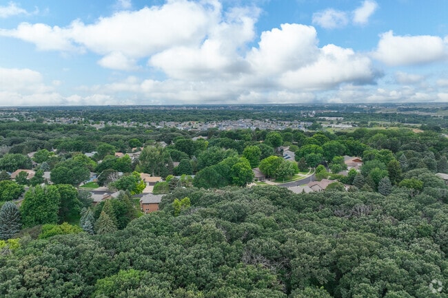 Oak View features large homes surrounded by mature trees and lush landscaping.