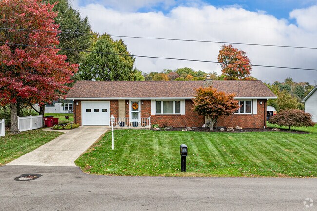 Brick ranch‑style homes sit on spacious lots across Unity Township.