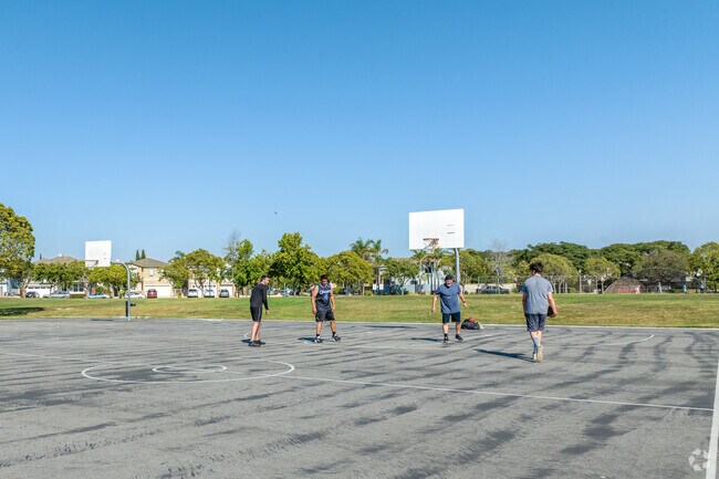 Play a pickup game of basketball at the nearby basketball courts in West Village Park.