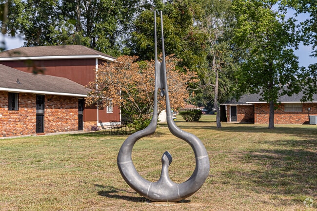 A Frank Hayden sculpture rests in Highland Farms.