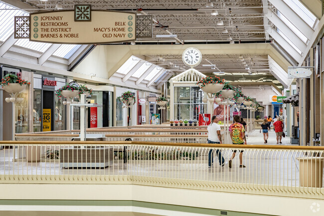 Friends enjoy a stroll through the mall just outside the Hollins neighborhood.