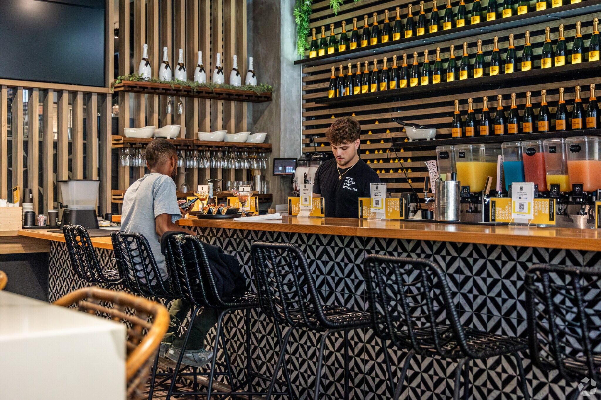 The Place 2 Be is a restaurant known for its lively atmosphere and diverse menu near North End.