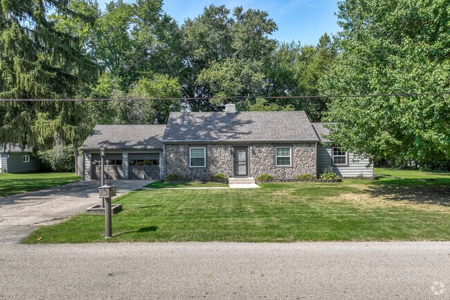Stone Cape Cod style homes offer texture and versatility in Arnold.
