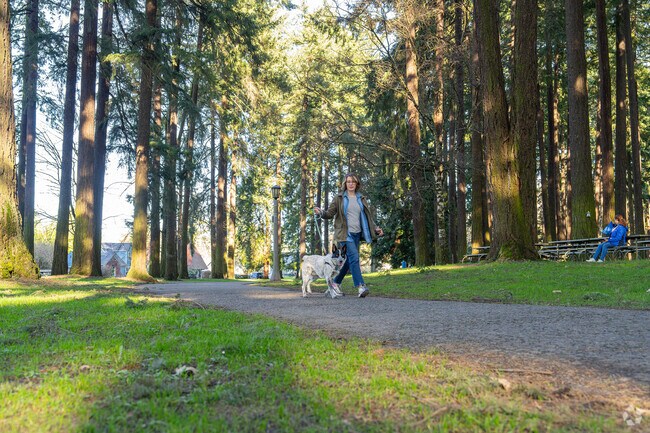 Take your dogs for a walk along the paved trails at Columbia Park in University Park, Portland.