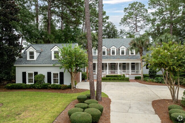 Large Cape Cod style homes are also available in Long Cove.