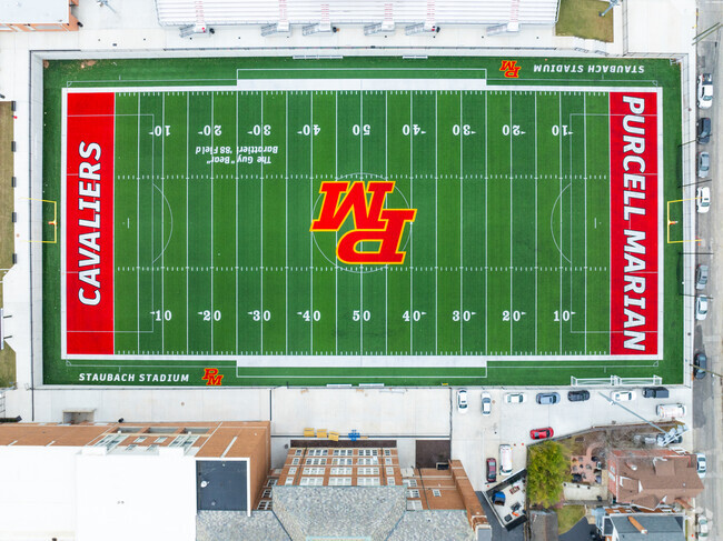 The Purcell Marian High School football stadium is right near the back of the building.