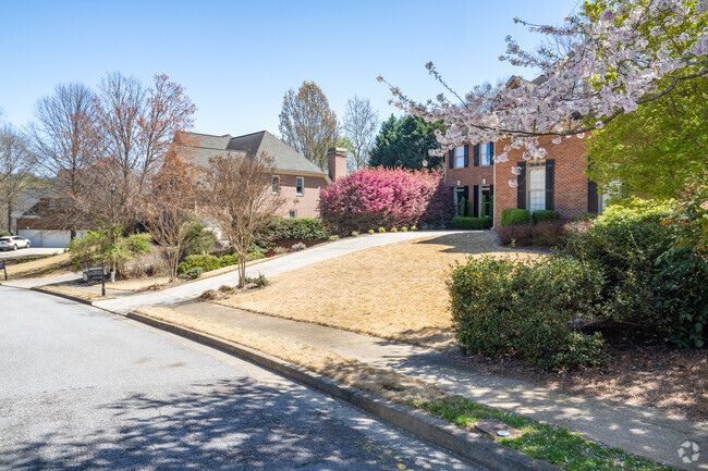 Newtown boasts leafy lawns and beautiful landscaping throughout the neighborhood.