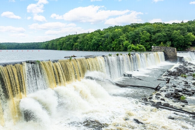 Shetucket Falls sets the natural soundtrack in Taftville.
