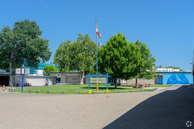 The American flag is flown at the center courtyard of the Anderson Union High School.