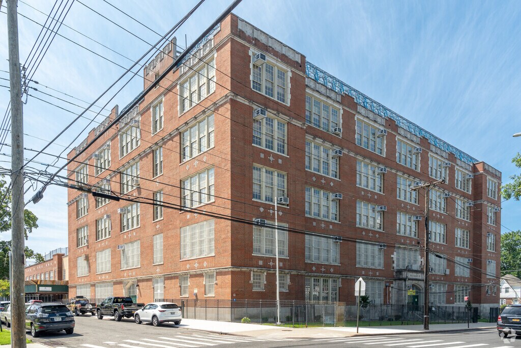 The entrance to PS 107 Thomas A Dooley is located on 45th Ave.