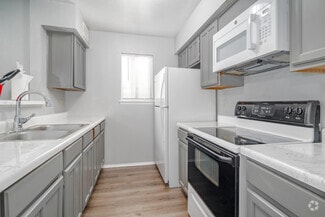 100 L C Martin Dr, Devine, TX 78016