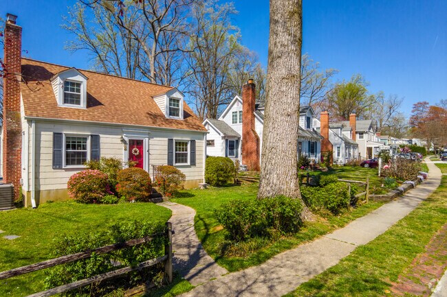 Charming Cape Cod elegance defines South Kensington living, where homes exude timeless allure.