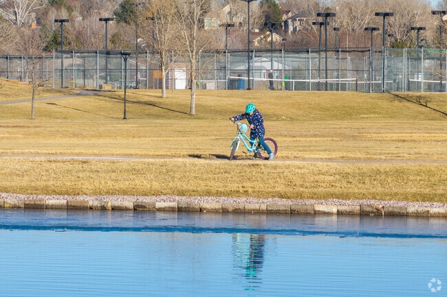 Fossil Creek Park in Fort Collins features lush open spaces with beautiful walking paths and ponds.