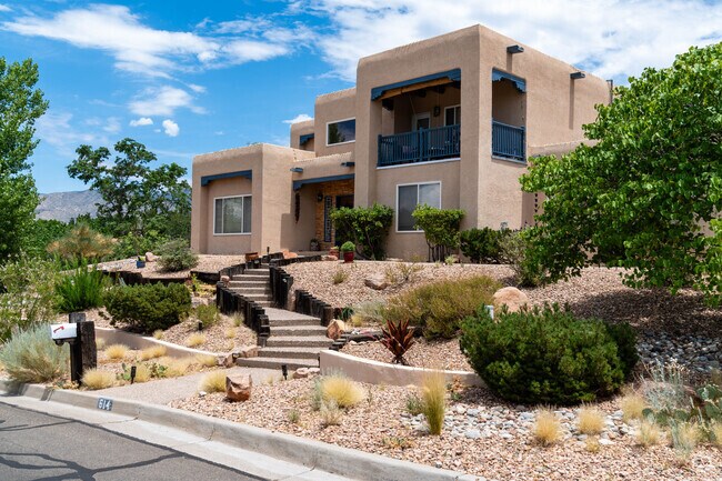 Four Hills Village showcases an abundance of adobe homes with desert landscaping.