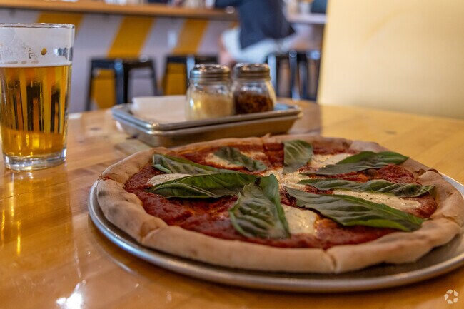 Iron John's Brewing serves up tasty margherita pizza's at their new pub near Duffy.