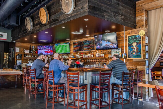 Slanted Tree Kitchen and Taproom offers delicious locally crafted beers in Green Valley .