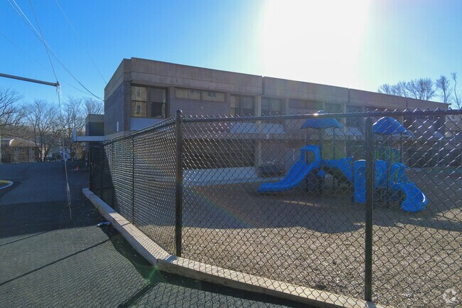 Students have fun while learning social skills on the playground at James F. Hennessey School.