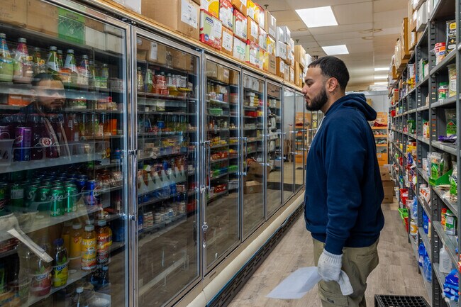A local residents searches for a delicious drink at South Shore Desi Market in East Braintree.