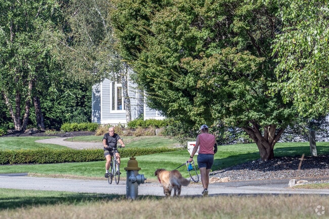 Quiet streets in Outer Tiverton invite biking and dog walking for a relaxed lifestyle.