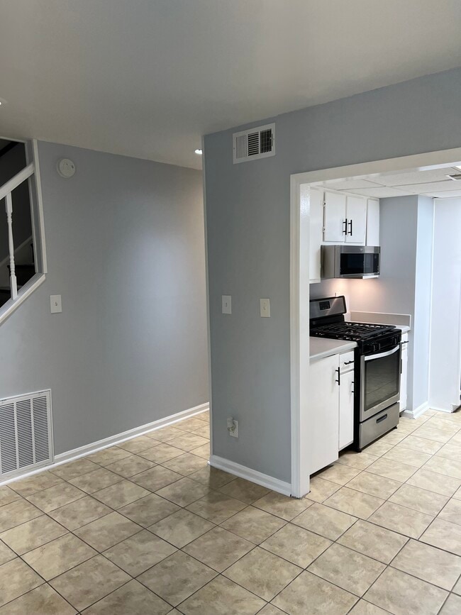 Wider angle view of dinning room to kitchen