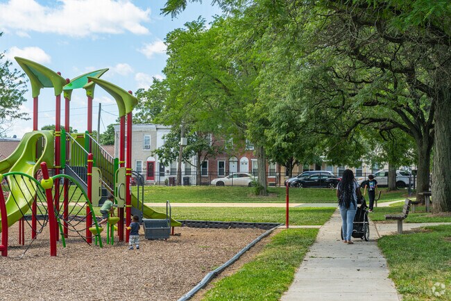 Tire out the tykes on the playground at Michaels Playground.