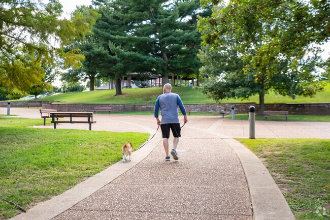 Walk your dog on the paved trails through Vlasis Park.