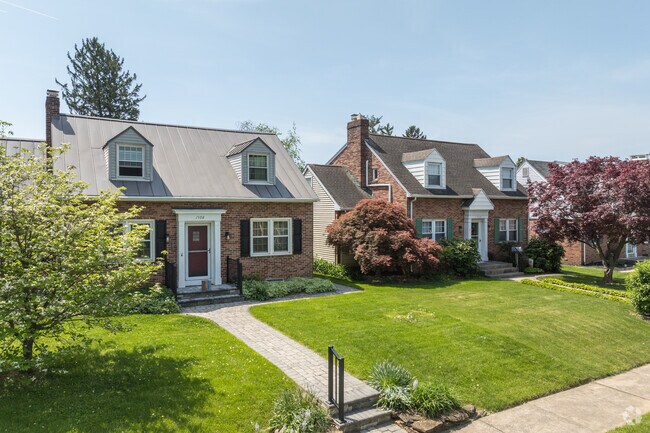 Cape Cod homes in Elmwood vary according to the tastes of their owners with some having metal roofs while some feature a pediment above the front entrance.