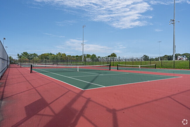 Students enjoy playing tennis on the tennis courts at Portland Middle School in Portland.