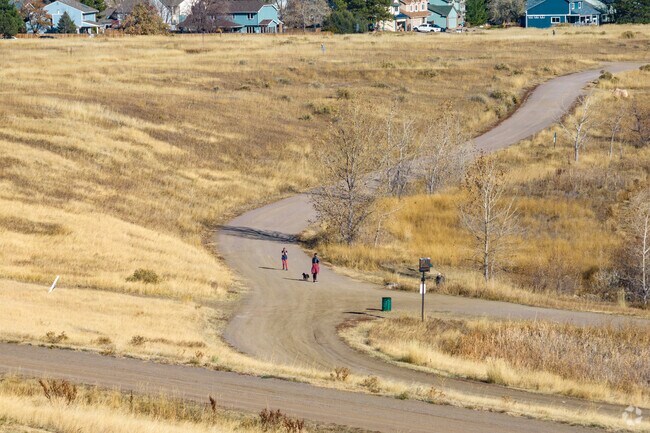 A lakeside trail at Robert A. Easton Regional Park, near Summit Ridge at West Meadows, provides scenic walking routes.