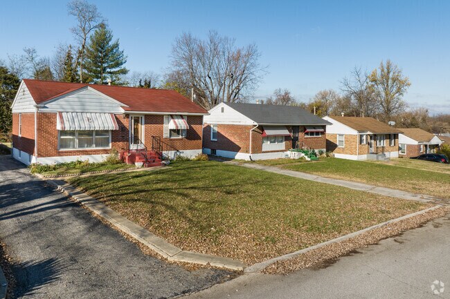 Three homes, one community—Breckenridge Hills, where neighborly warmth thrives.