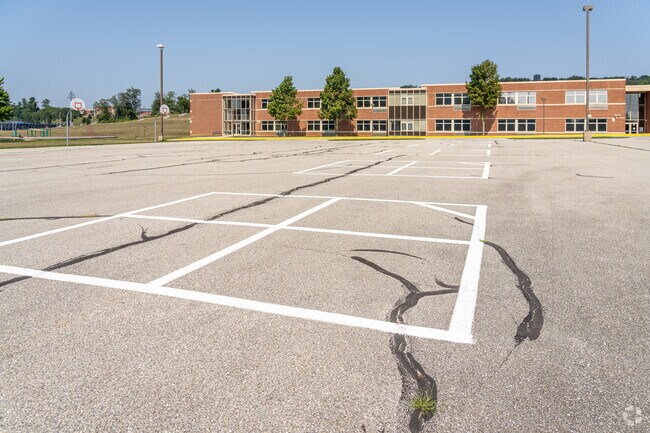 A parking lots doubles as a play space at Spring Grove Area Intermediate School.